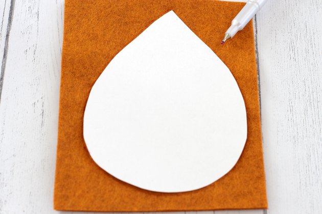 Bring that colorful fall feeling inside your home by creating a few vibrant felt coasters to protect your coffee table from those steaming cups of hot cocoa you'll be sipping.