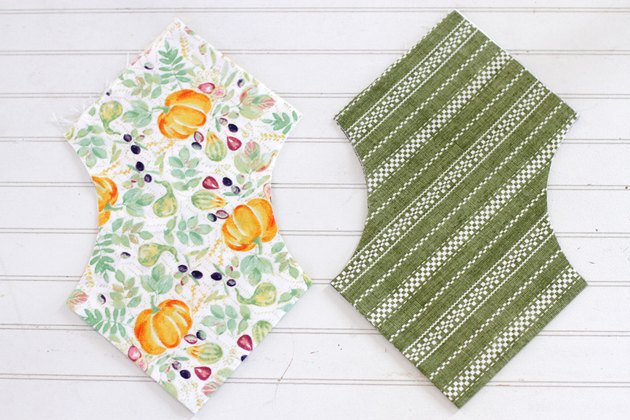 This holiday season, keep your rolls fresh and, at the same time, add some serious style to your table with a DIY fabric roll cover.