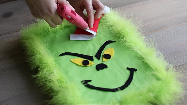 Gluing Santa hat to top of gift box