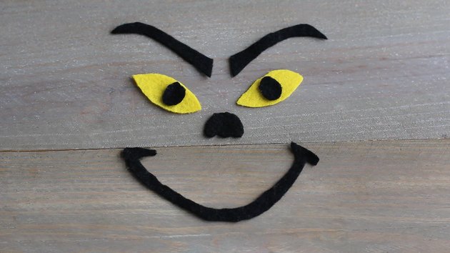 The Grinch's face features cut out of felt