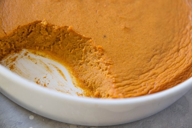 casserole dish of souffle with scoop taken out