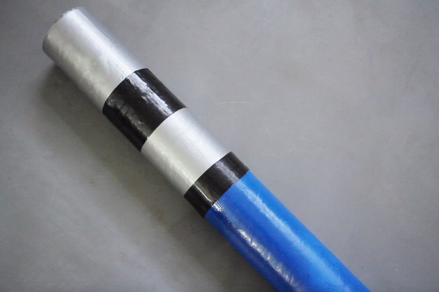 Black tape wrapped around mailing tube