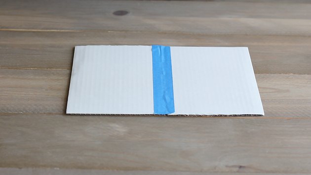 Taping two cake boards together