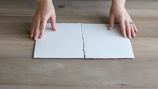 Taping two cake boards together