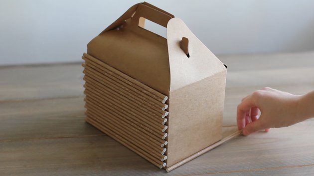 Measuring straws to fit the sides of box
