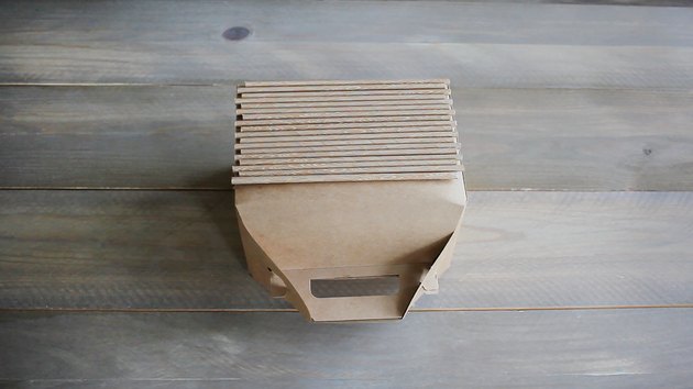 Paper straws glued to the sides of gable box