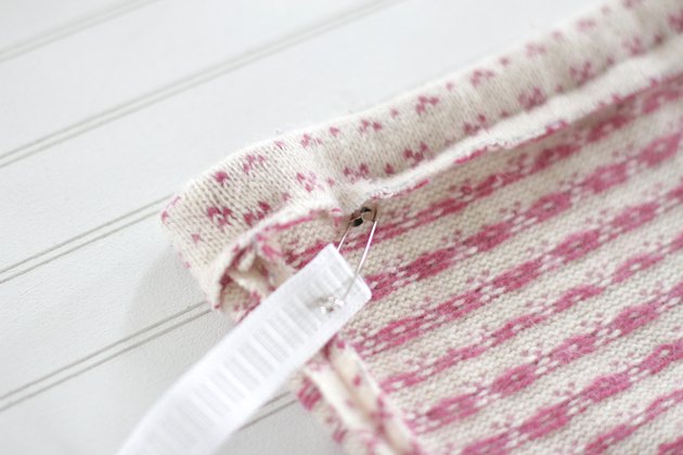 Pull out an old sweater from the bottom of your closet and create a cute and cozy sweater skirt for a little girl in your life.