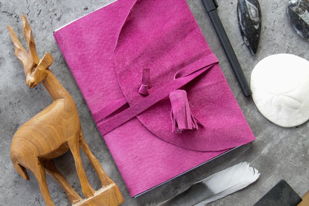 There are loads of unwanted suede jackets hanging around the thrift stores that can be made into these beautiful journal covers.