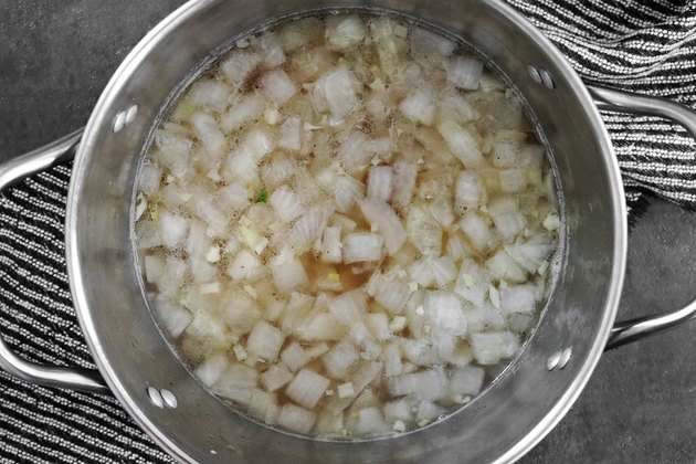 Add broth and cook potatoes