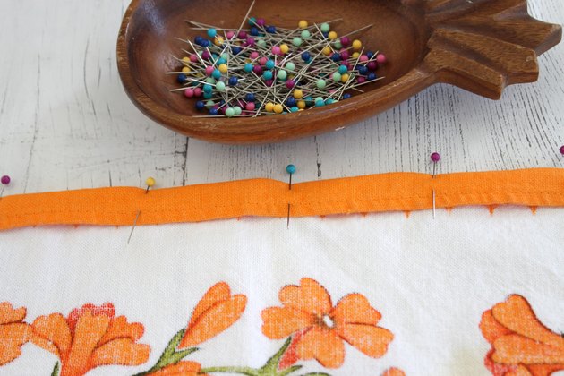 These eco-friendly bags can be made from fabric you already have or thrift shop dishtowels or curtain panels to make them double earth friendly.