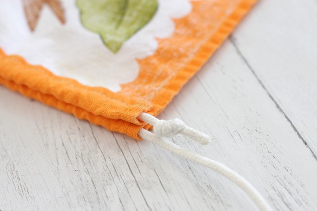 These eco-friendly bags can be made from fabric you already have or thrift shop dishtowels or curtain panels to make them double earth friendly.