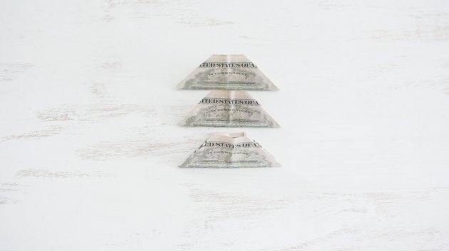 Three folded bills