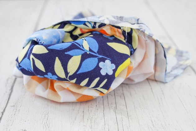 In addition to social distancing and having a list to reduce your time in the store, attach a washable handle cover to give you one more line of defense.