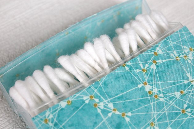 Transform empty plastic gum holders into first aid kits, sewing kits, gift card holders, and q-tip holders.