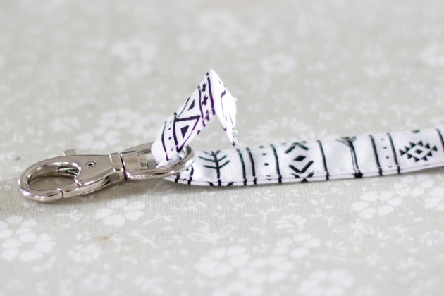 If you've been looking for the perfect do-it-yourself teacher gift, then look no further. This simple fabric key or badge lanyard will be the envy of all the other teachers.