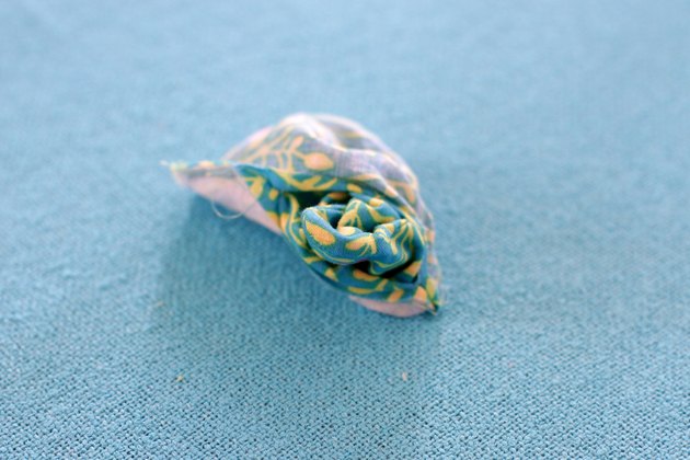 Keep those cords under control and detangled with these cute cord holders that you made yourself from a couple of pieces of scrap fabric.