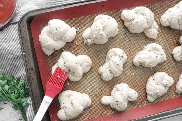 Brush knots with garlic butter
