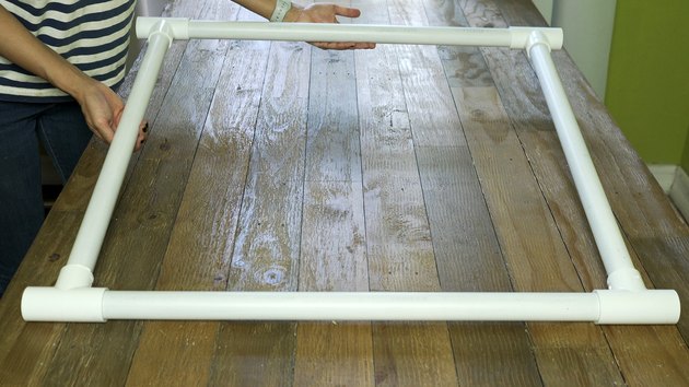 Assembling PVC pipes and tee connectors for DIY PVC Pipe Pet Gate