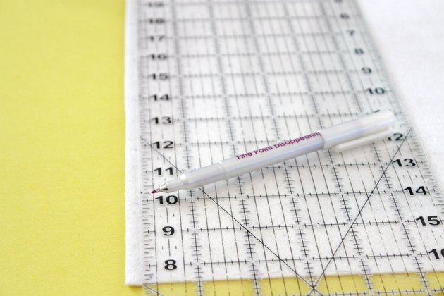 Create this handy checkerboard that's lightweight and convenient enough to throw in a drawer of your camper or even tote along in your backpack.