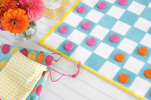 Create this handy checkerboard that's lightweight and convenient enough to throw in a drawer of your camper or even tote along in your backpack.