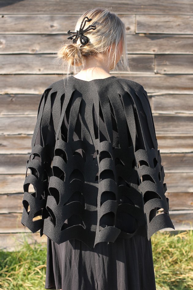 Embrace your spooky side, add a little mystery to your wardrobe and you might even catch some fun in your web when you wear this easy-to-make, no-sew, felt spider web poncho.