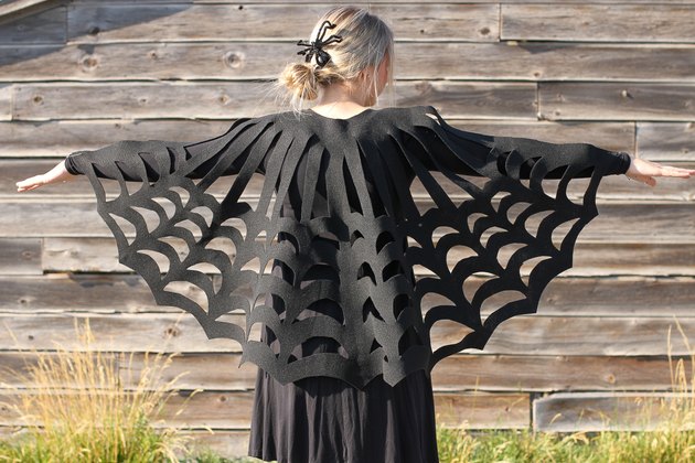 Embrace your spooky side, add a little mystery to your wardrobe and you might even catch some fun in your web when you wear this easy-to-make, no-sew, felt spider web poncho.