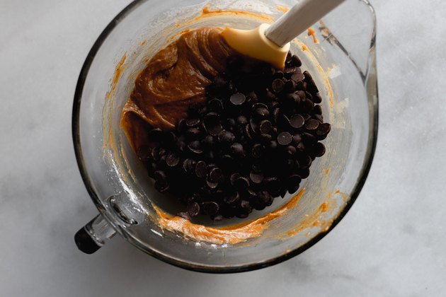 Put the chocolate chips into the dough bowl.