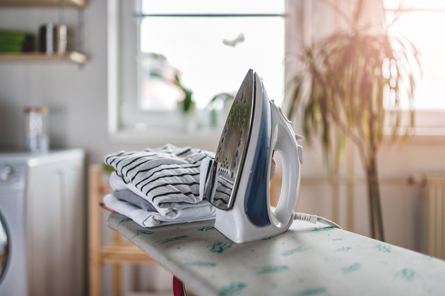 Ironing in the laundry room