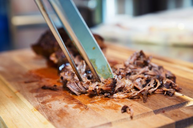 Pulled pork on wooden board
