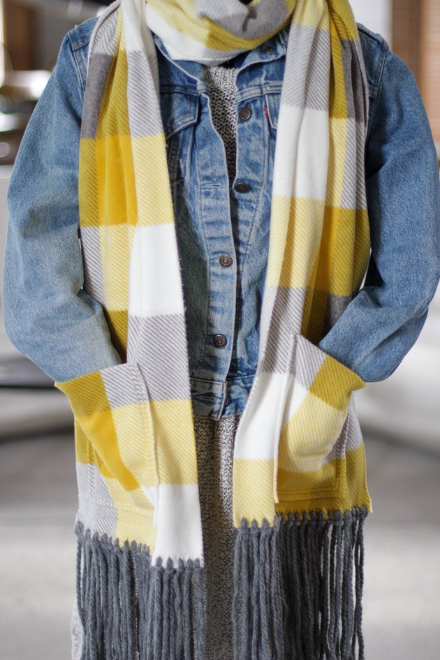 hands in scarf pockets