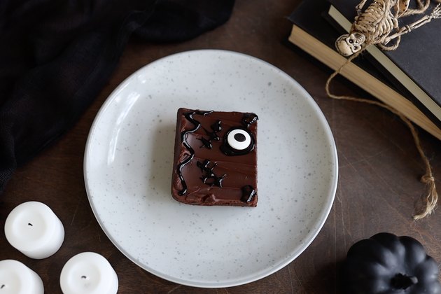 Stitch lines piped onto brownie with black icing