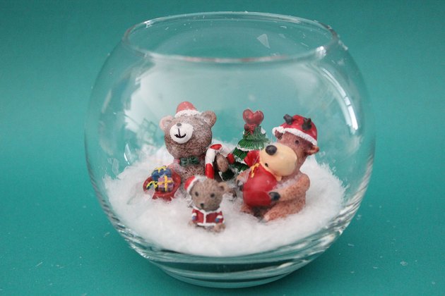figurines inside smallest fishbowl