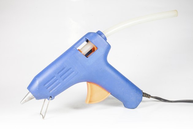 A glue gun is required in order to heat and melt the glue sticks.