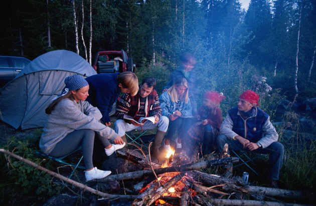 Group of people around camp fire
