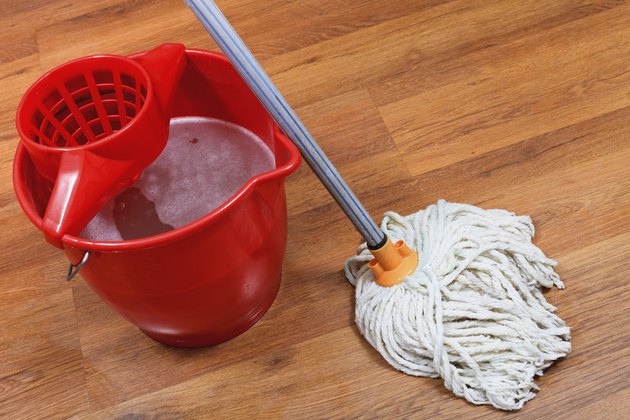 cleaning of floors by mop