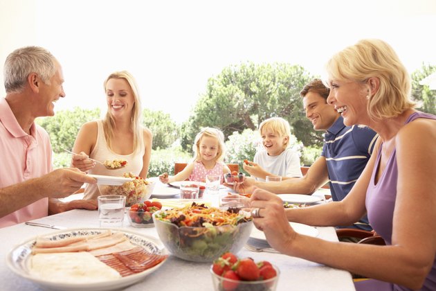Extended family, parents, grandparents and children,