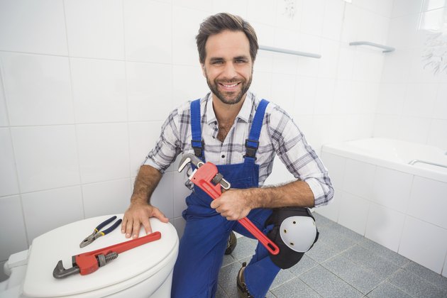 Plumber smiling at the camera