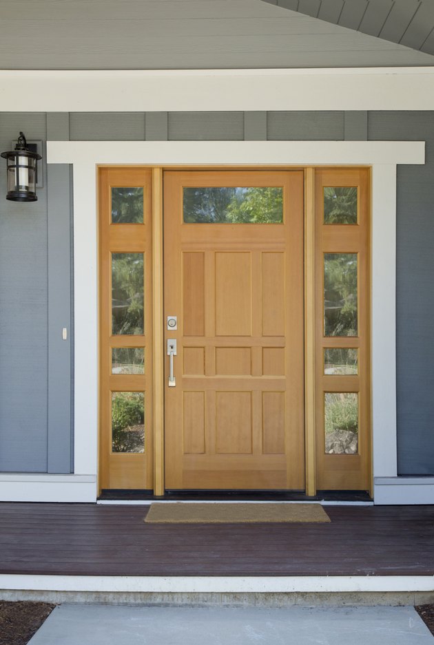 Closed wooden front door of a home