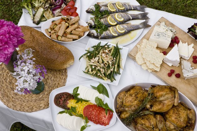 Food at outdoor dinner party in countryside