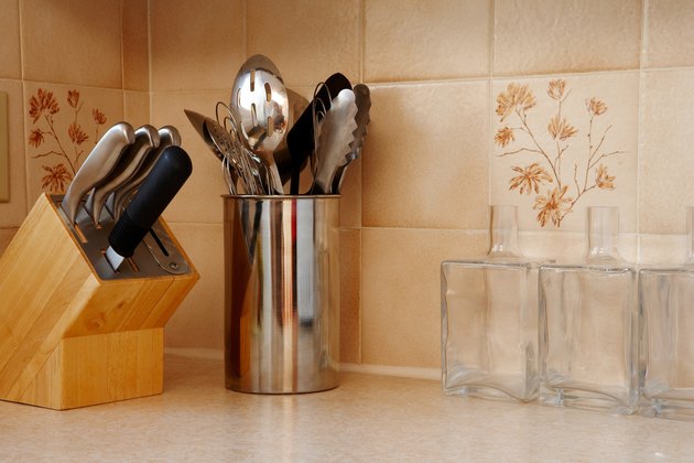 Utensils on kitchen countertop