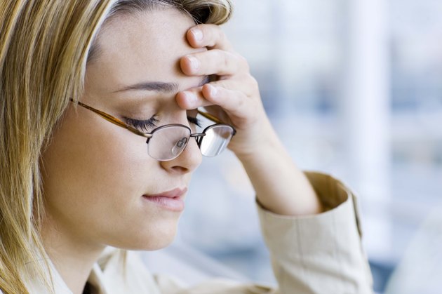 Businesswoman with headache
