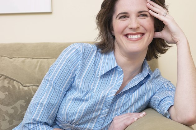 Woman smiling on couch