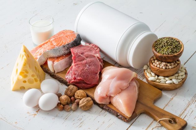 Selection of protein sources in kitchen background, copy space