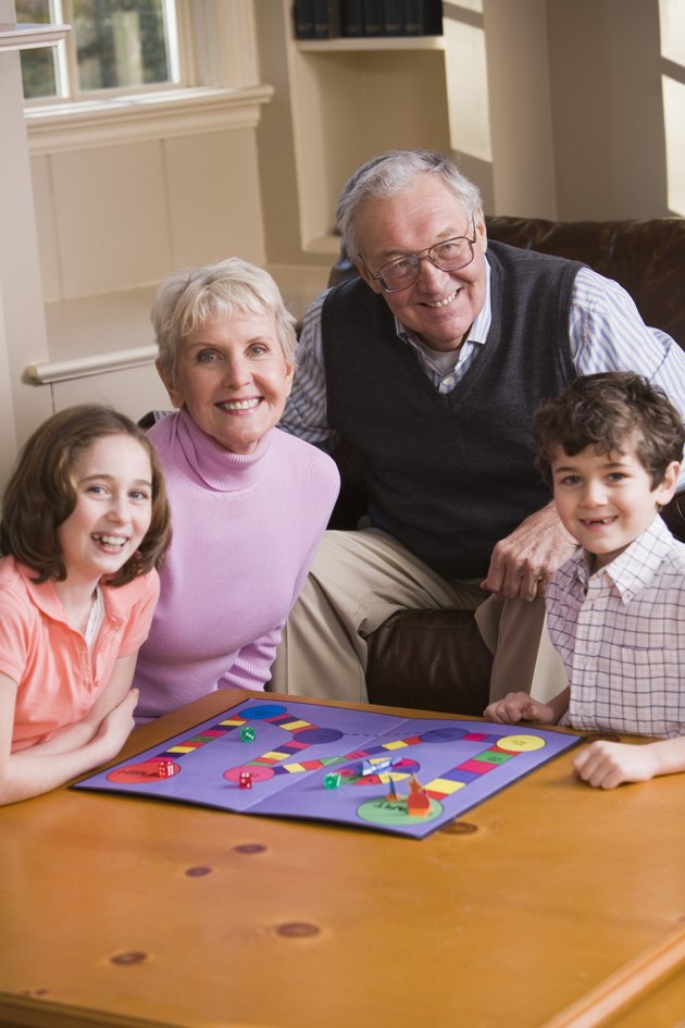 Grandparents playing game with grandchildren