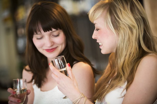 Girls drinking wine