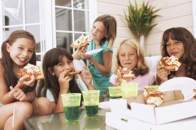 Girls having a pizza party