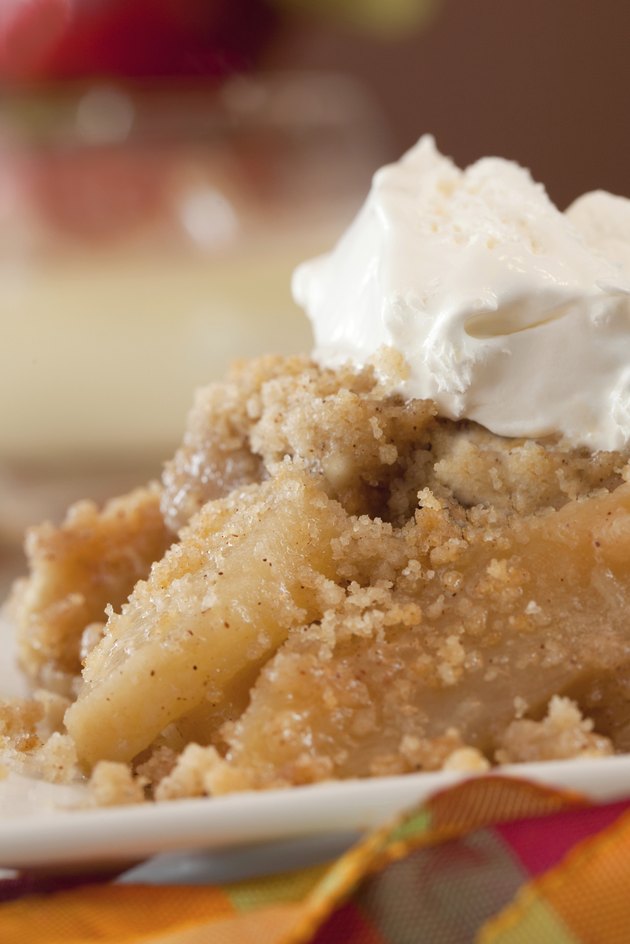 Dish Of Apple Crisp with Whipped Cream Topping