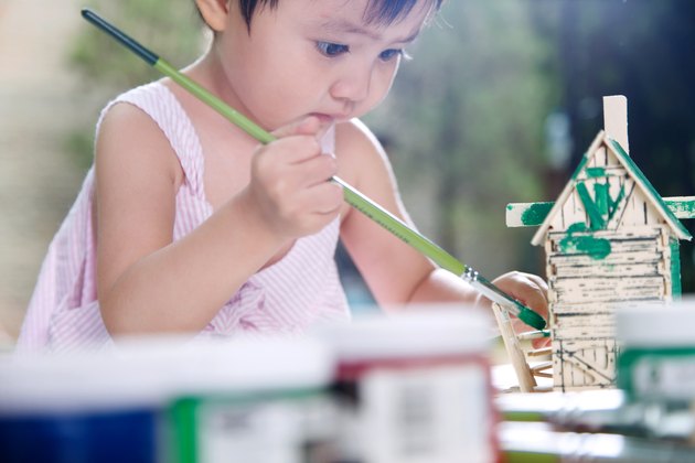 Little girl painting