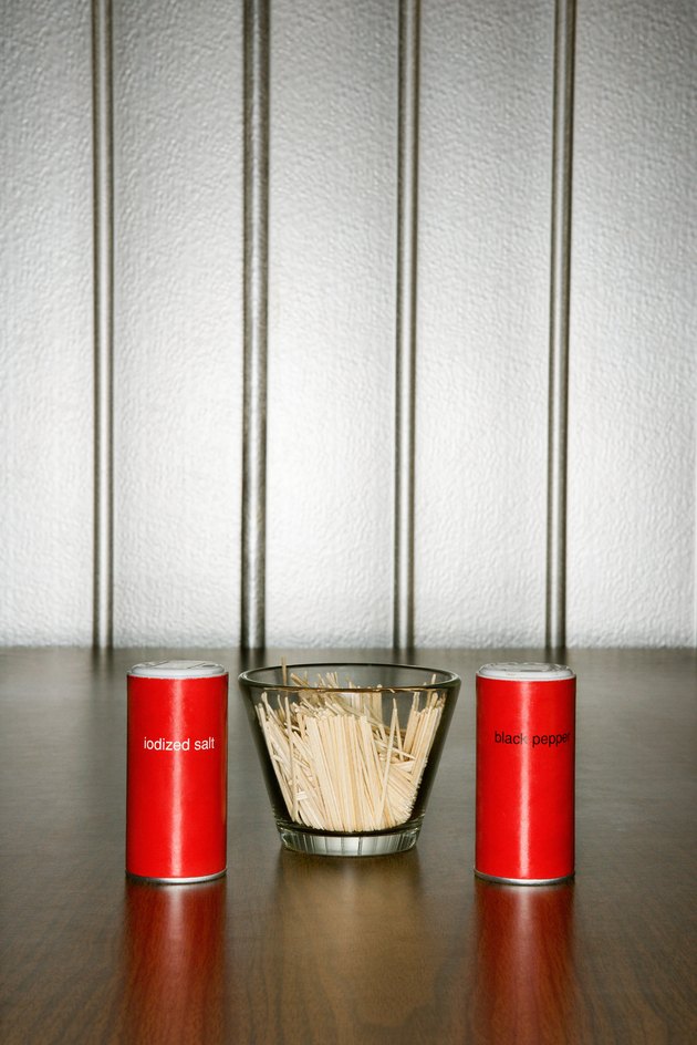 Salt and pepper shakers with toothpicks