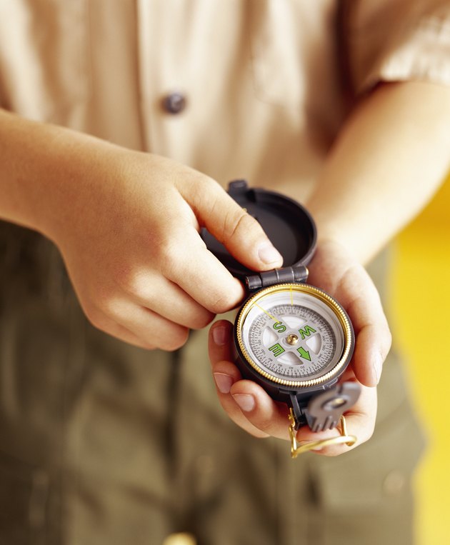 Boy scout with compass